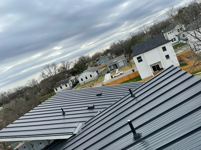 Standing seam metal roof panels with vents for Skylight Repair in Hayesville
